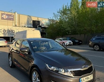 Серый Киа Оптима, объемом двигателя 2 л и пробегом 214 тыс. км за 10500 $, фото 1 на Automoto.ua