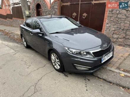 Серый Киа Оптима, объемом двигателя 2 л и пробегом 211 тыс. км за 10200 $, фото 1 на Automoto.ua
