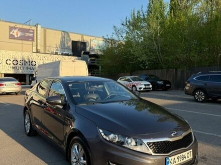 Серый Киа Оптима, объемом двигателя 2 л и пробегом 214 тыс. км за 10500 $, фото 1 на Automoto.ua