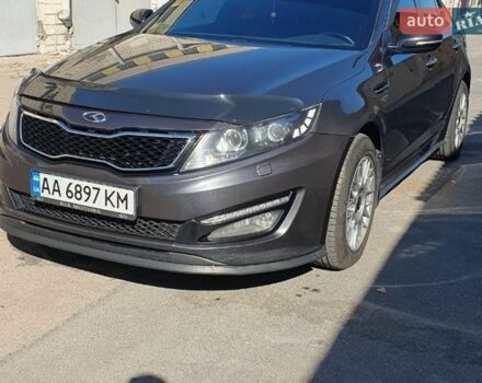 Сірий Кіа Оптіма, об'ємом двигуна 2 л та пробігом 215 тис. км за 10700 $, фото 1 на Automoto.ua