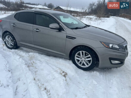 Сірий Кіа Оптіма, об'ємом двигуна 2.36 л та пробігом 215 тис. км за 8999 $, фото 1 на Automoto.ua