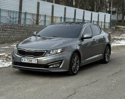 Сірий Кіа Оптіма, об'ємом двигуна 2 л та пробігом 220 тис. км за 8999 $, фото 1 на Automoto.ua