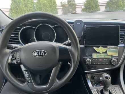 Серый Киа Оптима, объемом двигателя 2 л и пробегом 179 тыс. км за 7200 $, фото 1 на Automoto.ua