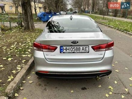 Серый Киа Оптима, объемом двигателя 1.59 л и пробегом 100 тыс. км за 11000 $, фото 1 на Automoto.ua