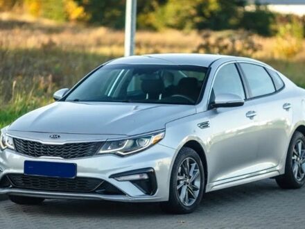 Серый Киа Оптима, объемом двигателя 2 л и пробегом 125 тыс. км за 9800 $, фото 1 на Automoto.ua
