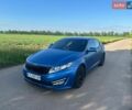 Синий Киа Оптима, объемом двигателя 2.36 л и пробегом 259 тыс. км за 8000 $, фото 2 на Automoto.ua
