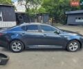 Синий Киа Оптима, объемом двигателя 2.36 л и пробегом 204 тыс. км за 5600 $, фото 5 на Automoto.ua