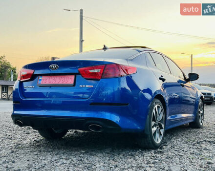 Синий Киа Оптима, объемом двигателя 2 л и пробегом 202 тыс. км за 11500 $, фото 7 на Automoto.ua