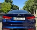 Синій Кіа Оптіма, об'ємом двигуна 2 л та пробігом 146 тис. км за 14800 $, фото 5 на Automoto.ua