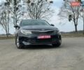 Синій Кіа Оптіма, об'ємом двигуна 2 л та пробігом 234 тис. км за 12900 $, фото 12 на Automoto.ua