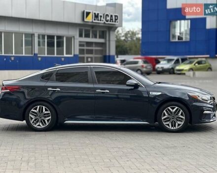 Синій Кіа Оптіма, об'ємом двигуна 2 л та пробігом 109 тис. км за 19990 $, фото 3 на Automoto.ua