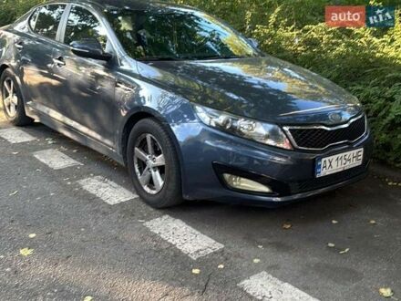 Синий Киа Оптима, объемом двигателя 2.36 л и пробегом 240 тыс. км за 4000 $, фото 1 на Automoto.ua