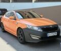 Оранжевый Киа Оптима, объемом двигателя 2 л и пробегом 200 тыс. км за 5700 $, фото 1 на Automoto.ua