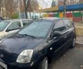 Черный Киа Пиканто, объемом двигателя 1.1 л и пробегом 215 тыс. км за 3850 $, фото 1 на Automoto.ua
