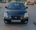 Черный Киа Пиканто, объемом двигателя 1.09 л и пробегом 185 тыс. км за 3500 $, фото 1 на Automoto.ua