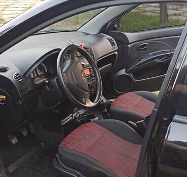 Чорний Кіа Піканто, об'ємом двигуна 1.09 л та пробігом 126 тис. км за 4999 $, фото 1 на Automoto.ua