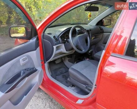 Красный Киа Пиканто, объемом двигателя 1.09 л и пробегом 165 тыс. км за 4150 $, фото 10 на Automoto.ua