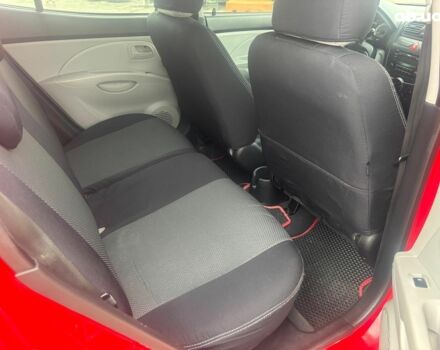 Червоний Кіа Піканто, об'ємом двигуна 1.1 л та пробігом 135 тис. км за 6390 $, фото 16 на Automoto.ua