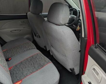 Красный Киа Пиканто, объемом двигателя 1.1 л и пробегом 200 тыс. км за 4500 $, фото 3 на Automoto.ua