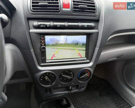 Желтый Киа Пиканто, объемом двигателя 1.1 л и пробегом 134 тыс. км за 5450 $, фото 25 на Automoto.ua