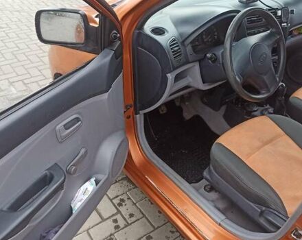 Оранжевый Киа Пиканто, объемом двигателя 1 л и пробегом 255 тыс. км за 3150 $, фото 10 на Automoto.ua