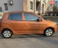 Оранжевый Киа Пиканто, объемом двигателя 1.1 л и пробегом 133 тыс. км за 4500 $, фото 6 на Automoto.ua