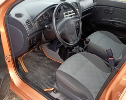 Помаранчевий Кіа Піканто, об'ємом двигуна 1.1 л та пробігом 150 тис. км за 4100 $, фото 4 на Automoto.ua