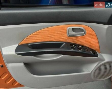 Помаранчевий Кіа Піканто, об'ємом двигуна 1.09 л та пробігом 174 тис. км за 4799 $, фото 8 на Automoto.ua