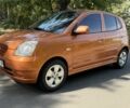 Оранжевый Киа Пиканто, объемом двигателя 1.1 л и пробегом 158 тыс. км за 3900 $, фото 1 на Automoto.ua