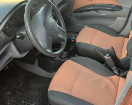 Помаранчевий Кіа Піканто, об'ємом двигуна 1.1 л та пробігом 257 тис. км за 3900 $, фото 4 на Automoto.ua