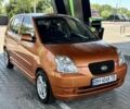 Оранжевый Киа Пиканто, объемом двигателя 1.1 л и пробегом 200 тыс. км за 4400 $, фото 1 на Automoto.ua