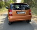 Оранжевый Киа Пиканто, объемом двигателя 1.1 л и пробегом 158 тыс. км за 3900 $, фото 3 на Automoto.ua