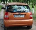 Оранжевый Киа Пиканто, объемом двигателя 1.09 л и пробегом 154 тыс. км за 5400 $, фото 5 на Automoto.ua