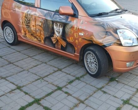 Помаранчевий Кіа Піканто, об'ємом двигуна 1.1 л та пробігом 257 тис. км за 3900 $, фото 3 на Automoto.ua