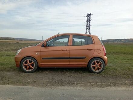 Оранжевый Киа Пиканто, объемом двигателя 1.1 л и пробегом 150 тыс. км за 4100 $, фото 1 на Automoto.ua