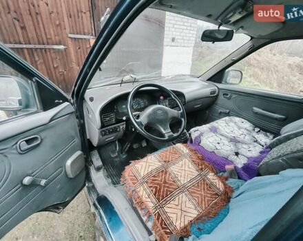 Синий Киа Преджио, объемом двигателя 2.7 л и пробегом 280 тыс. км за 2000 $, фото 2 на Automoto.ua