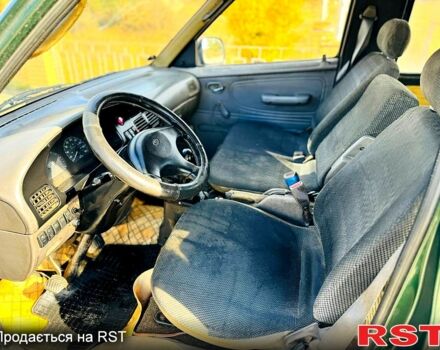 Зелений Кіа Преджіо, об'ємом двигуна 2.7 л та пробігом 320 тис. км за 1350 $, фото 4 на Automoto.ua