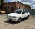 Белый Киа Прайд, объемом двигателя 1.3 л и пробегом 185 тыс. км за 600 $, фото 1 на Automoto.ua