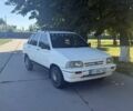 Белый Киа Прайд, объемом двигателя 1.3 л и пробегом 105 тыс. км за 750 $, фото 1 на Automoto.ua