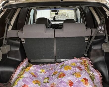 Белый Киа Прайд, объемом двигателя 1.3 л и пробегом 260 тыс. км за 950 $, фото 5 на Automoto.ua