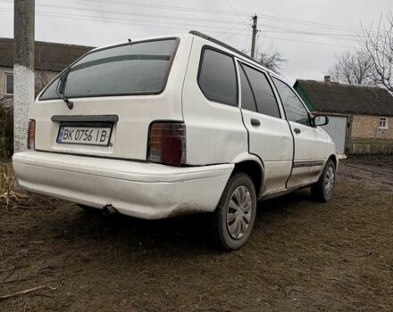 Белый Киа Прайд, объемом двигателя 1.3 л и пробегом 260 тыс. км за 950 $, фото 2 на Automoto.ua