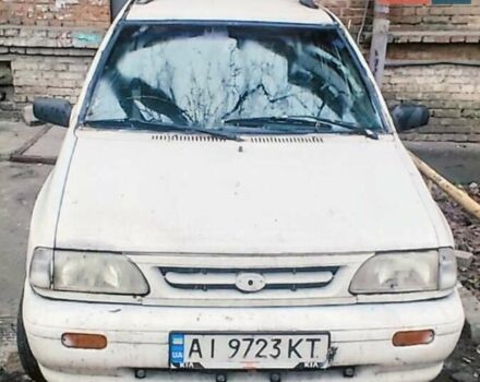 Белый Киа Прайд, объемом двигателя 1.32 л и пробегом 263 тыс. км за 630 $, фото 1 на Automoto.ua