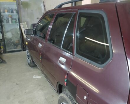 Красный Киа Прайд, объемом двигателя 1.3 л и пробегом 238 тыс. км за 1300 $, фото 3 на Automoto.ua