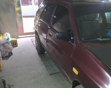 Красный Киа Прайд, объемом двигателя 1.3 л и пробегом 238 тыс. км за 1300 $, фото 1 на Automoto.ua