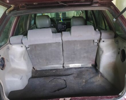 Красный Киа Прайд, объемом двигателя 1.3 л и пробегом 238 тыс. км за 1300 $, фото 6 на Automoto.ua