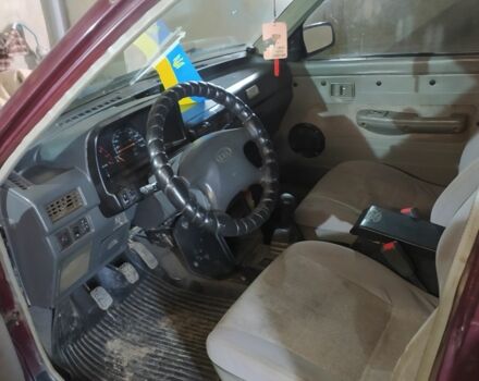 Красный Киа Прайд, объемом двигателя 1.3 л и пробегом 238 тыс. км за 1300 $, фото 4 на Automoto.ua