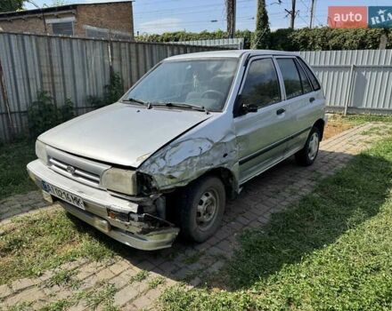 Серый Киа Прайд, объемом двигателя 1.3 л и пробегом 266 тыс. км за 600 $, фото 1 на Automoto.ua