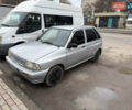 Серый Киа Прайд, объемом двигателя 1.32 л и пробегом 202 тыс. км за 700 $, фото 1 на Automoto.ua