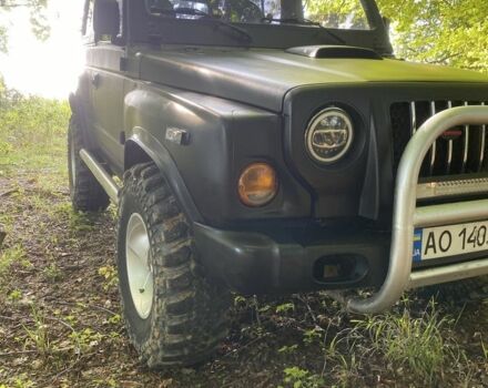 Чорний Кіа Ретона, об'ємом двигуна 2 л та пробігом 150 тис. км за 7500 $, фото 1 на Automoto.ua