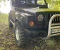 Чорний Кіа Ретона, об'ємом двигуна 2 л та пробігом 150 тис. км за 7500 $, фото 1 на Automoto.ua